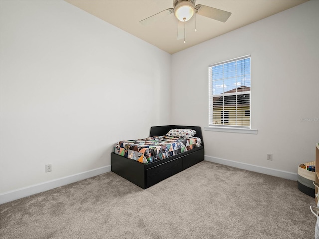 bedroom featuring ceiling fan and light colored carpet