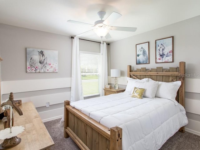 bedroom with dark carpet and ceiling fan