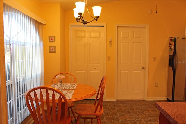 dining room featuring an inviting chandelier