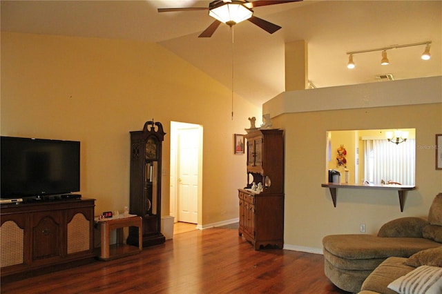 living room with dark hardwood / wood-style flooring, high vaulted ceiling, and ceiling fan