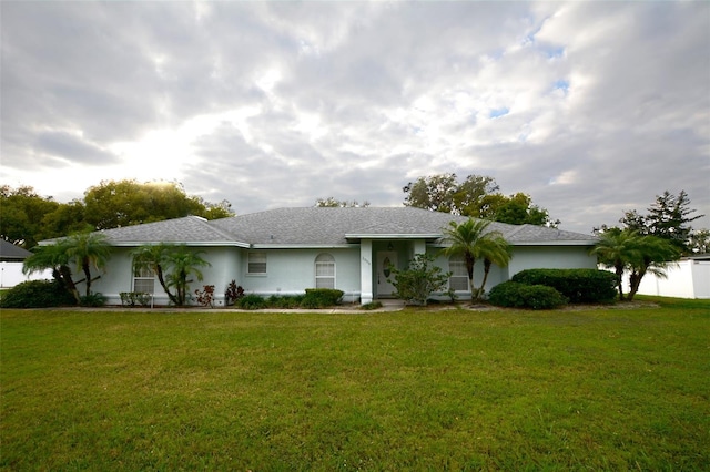 ranch-style house with a front yard