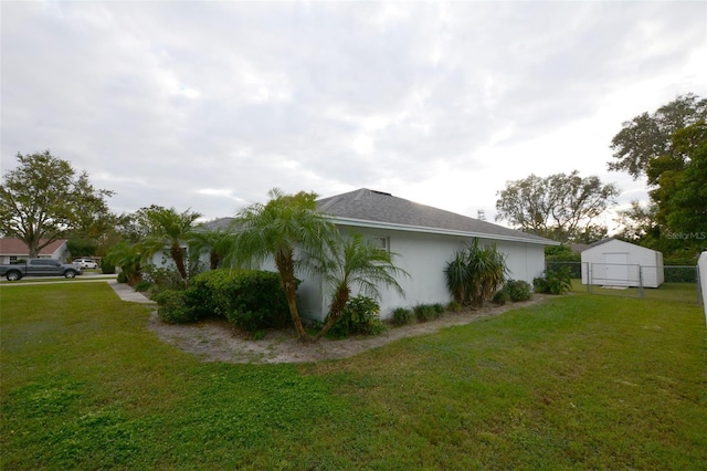 view of property exterior with a yard