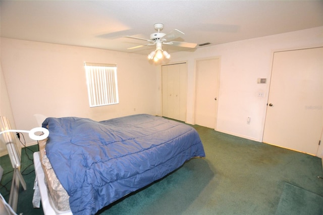 carpeted bedroom with ceiling fan