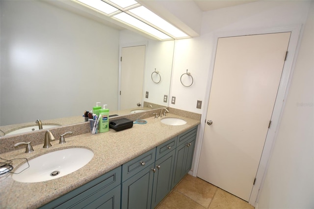 bathroom featuring tile patterned floors and vanity