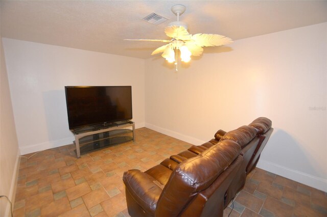 living room featuring ceiling fan