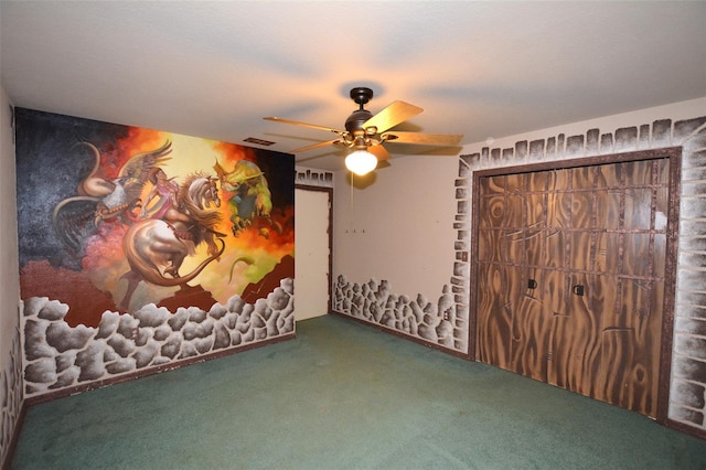 unfurnished bedroom featuring carpet and ceiling fan