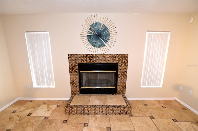 2556 Roslyn Ln, Lakeland, FL 33812 - interior details featuring baseboards and a fireplace