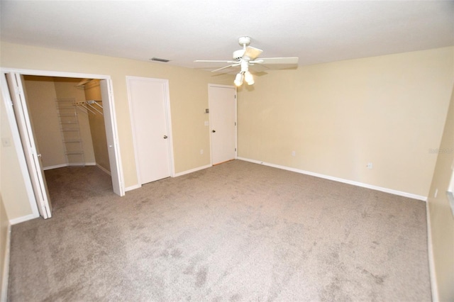 2556 Roslyn Ln, Lakeland, FL 33812 - unfurnished bedroom featuring ceiling fan, baseboards, carpet flooring, and visible vents
