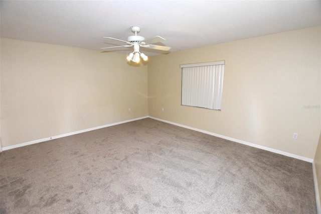 2556 Roslyn Ln, Lakeland, FL 33812 - empty room featuring carpet flooring, a ceiling fan, and baseboards