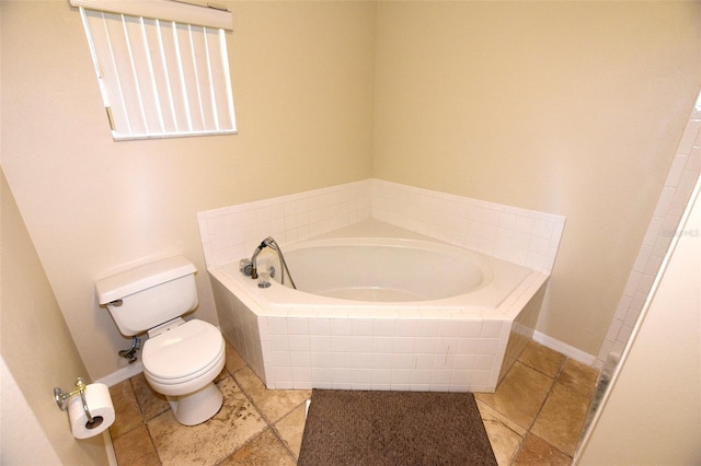 2556 Roslyn Ln, Lakeland, FL 33812 - full bathroom featuring a garden tub, baseboards, tile patterned flooring, and toilet