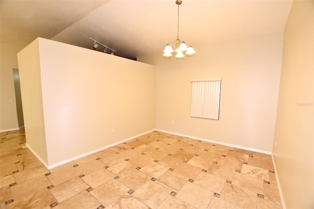 2556 Roslyn Ln, Lakeland, FL 33812 - spare room featuring lofted ceiling, baseboards, and a notable chandelier