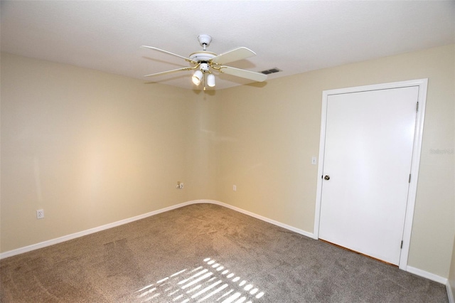 2556 Roslyn Ln, Lakeland, FL 33812 - spare room featuring ceiling fan, carpet floors, visible vents, and baseboards