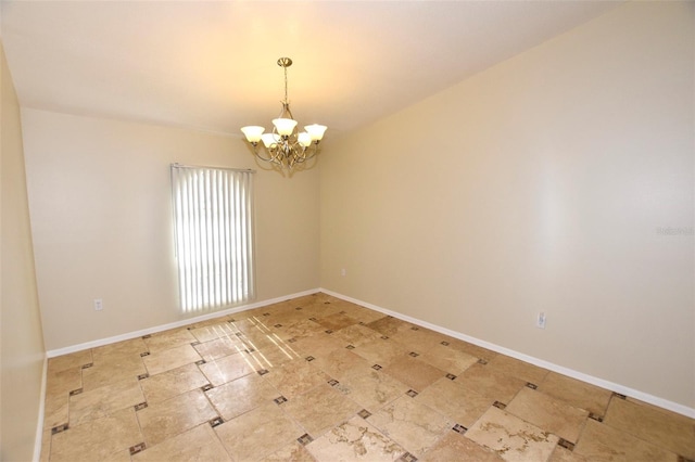 2556 Roslyn Ln, Lakeland, FL 33812 - unfurnished room with baseboards and a chandelier