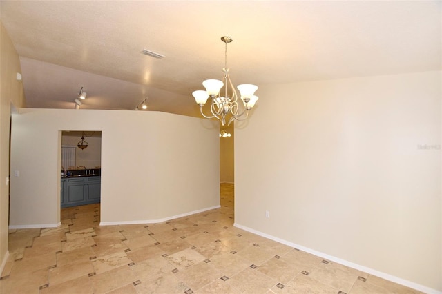 2556 Roslyn Ln, Lakeland, FL 33812 - unfurnished room featuring visible vents, vaulted ceiling, baseboards, and an inviting chandelier