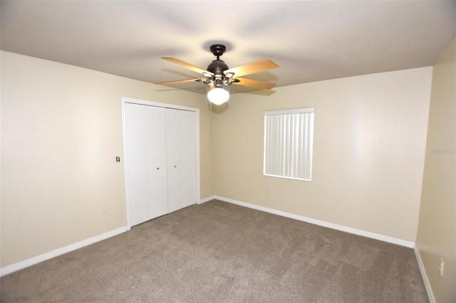 2556 Roslyn Ln, Lakeland, FL 33812 - unfurnished bedroom with baseboards, carpet flooring, and a closet