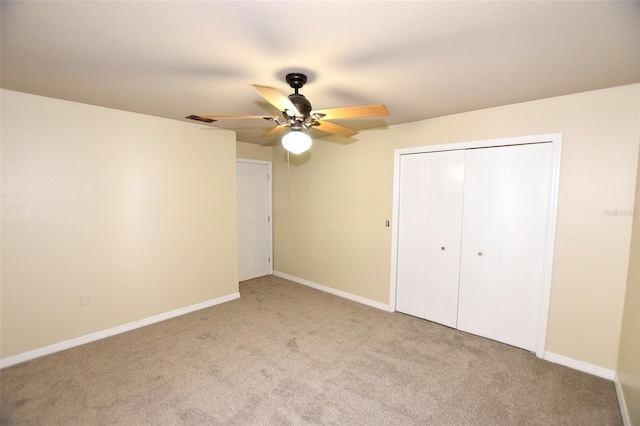 2556 Roslyn Ln, Lakeland, FL 33812 - unfurnished bedroom featuring baseboards, light carpet, visible vents, and a closet