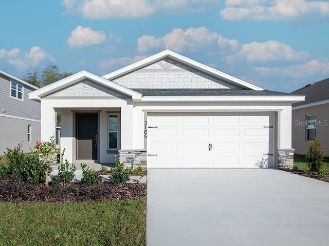 view of front of home with a garage