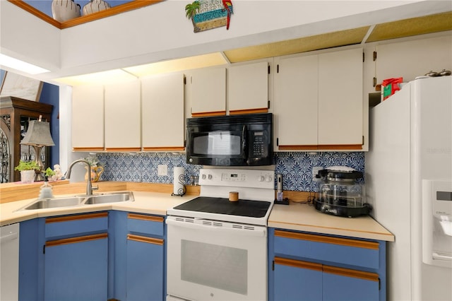 kitchen with white cabinets, white appliances, sink, and tasteful backsplash