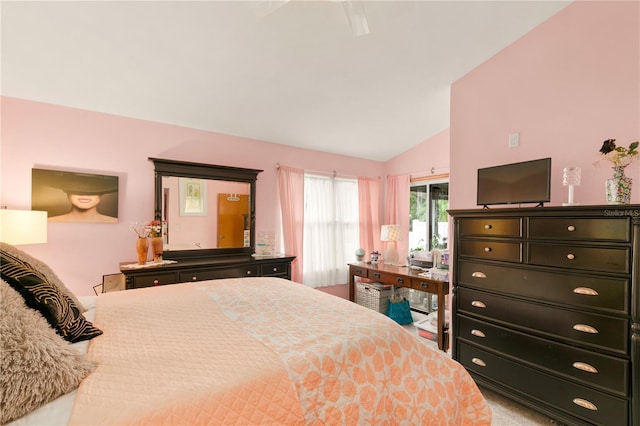 carpeted bedroom featuring high vaulted ceiling