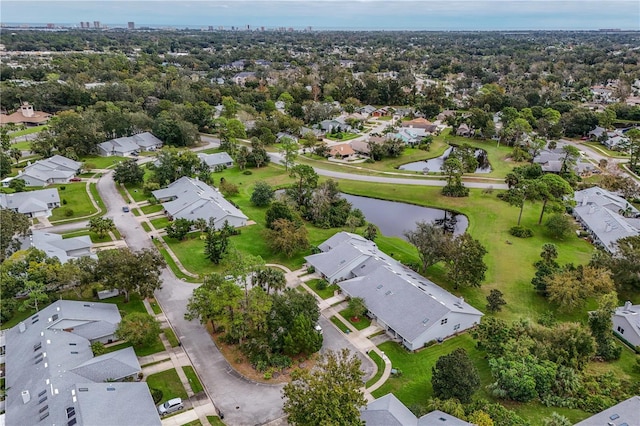 bird's eye view with a water view