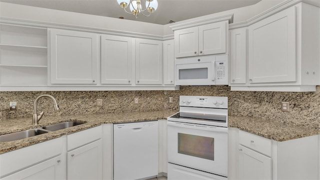 kitchen featuring white cabinetry, white appliances, sink, and tasteful backsplash