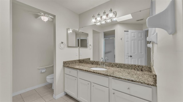 bathroom with ceiling fan, walk in shower, tile patterned flooring, toilet, and vanity