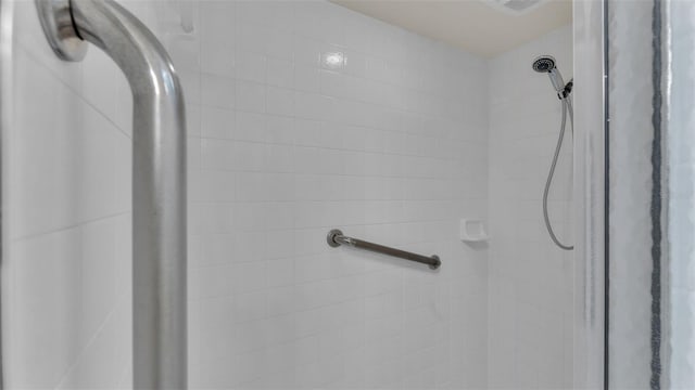 details with a tile shower