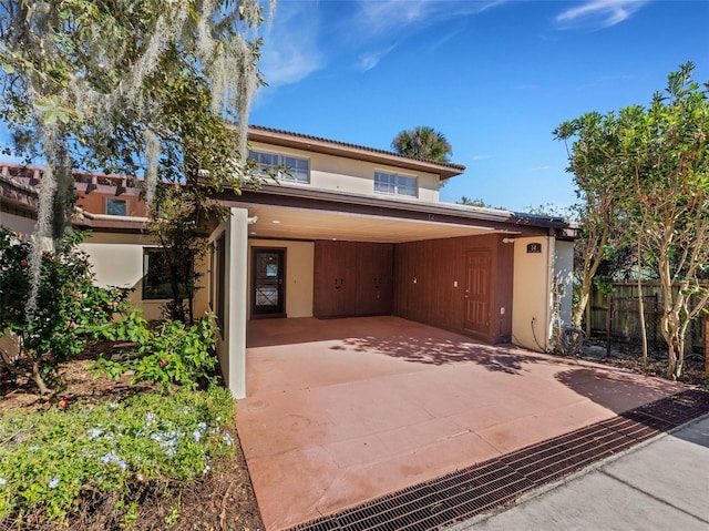 view of front of house with a carport