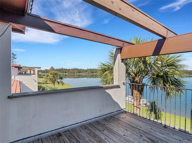 deck featuring a water view