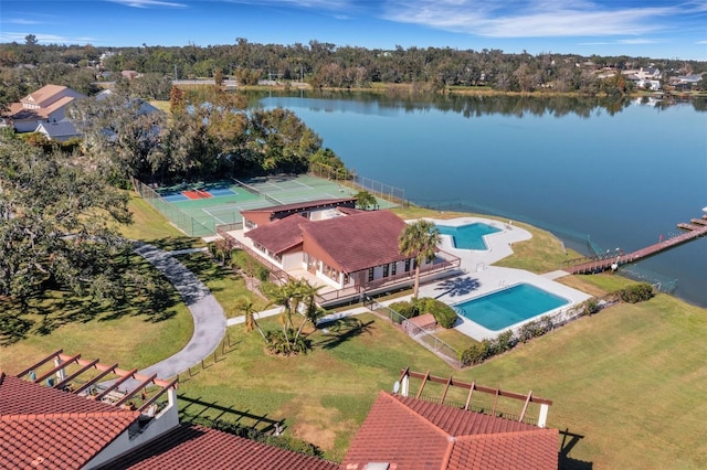 birds eye view of property featuring a water view