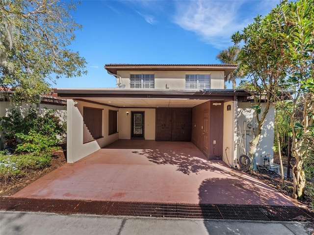 view of front of house featuring a carport