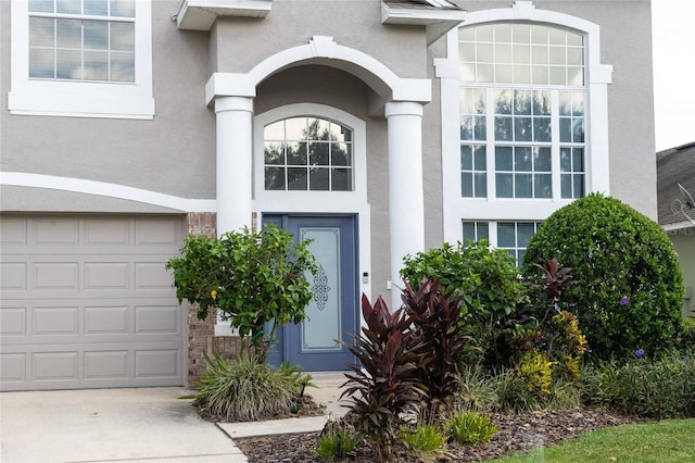 property entrance featuring a garage