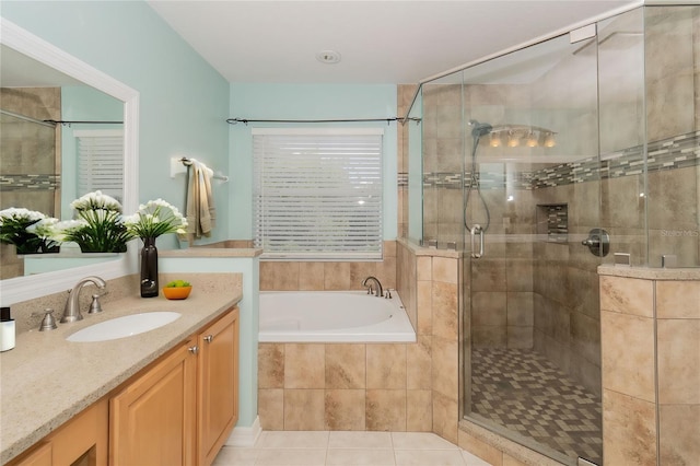 bathroom with vanity, separate shower and tub, and tile patterned floors