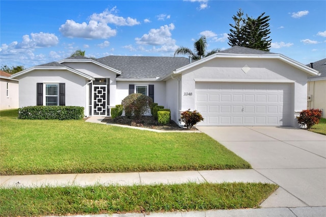 single story home with a front lawn and a garage