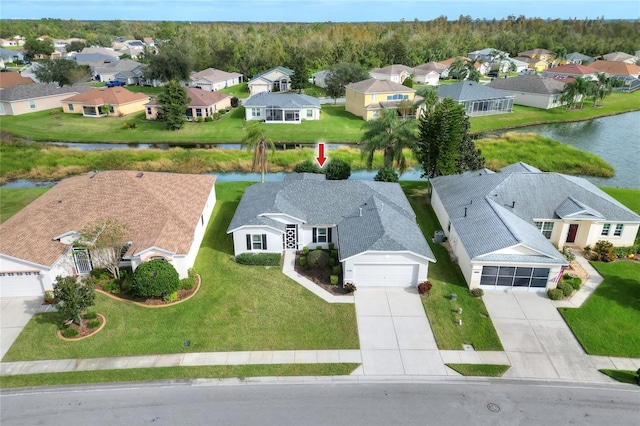 drone / aerial view featuring a water view