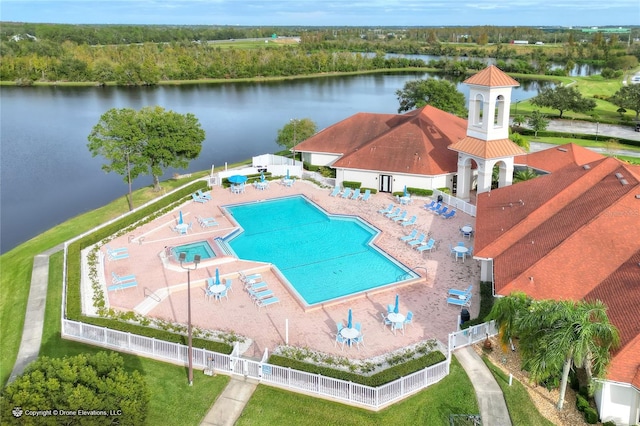 view of pool featuring a water view