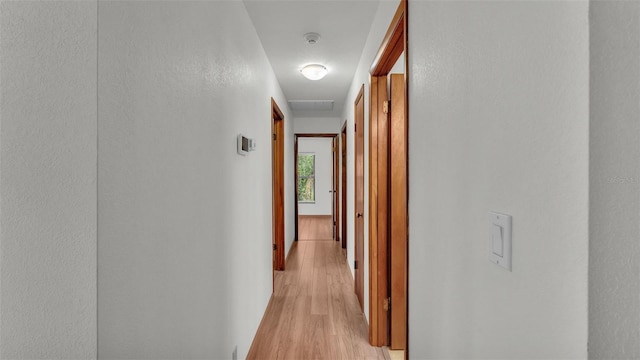 hallway featuring light hardwood / wood-style floors