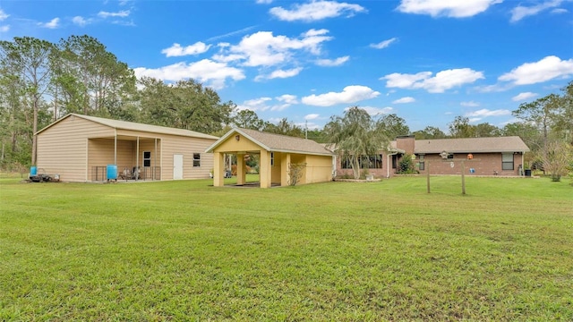 9240 Moore Rd, Lakeland, FL 33809 - rear view of property with a lawn