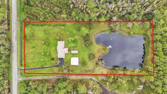 9240 Moore Rd, Lakeland, FL 33809 - aerial view of property and surrounding area with a large body of water and property parcel outlined