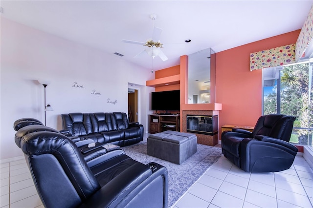 tiled living room featuring ceiling fan