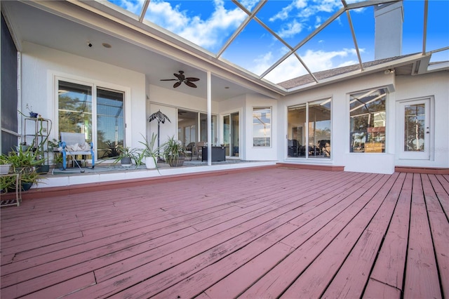 deck with ceiling fan and a lanai