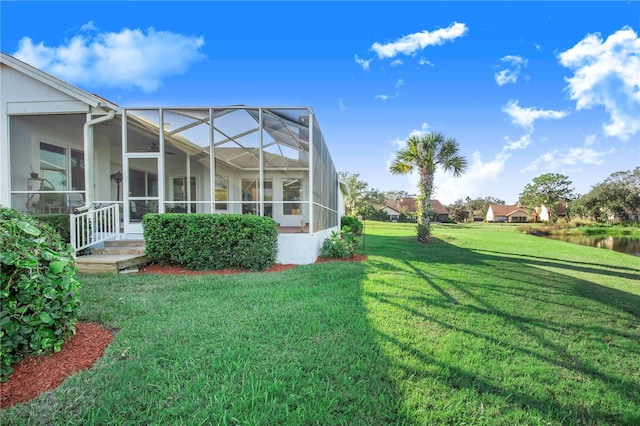 view of yard with a lanai