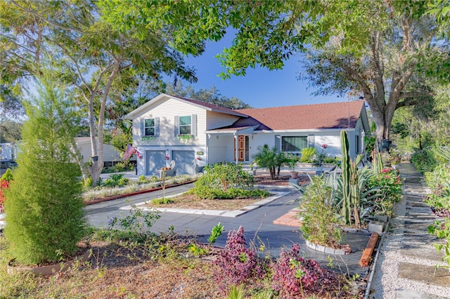 view of front of home with a garage