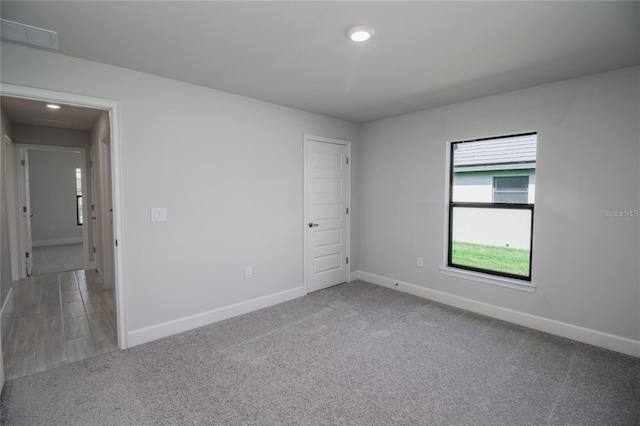 view of carpeted spare room