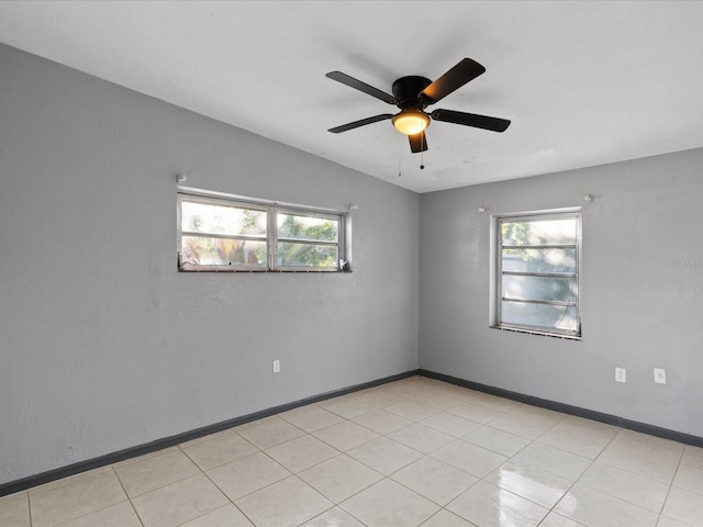 unfurnished room featuring lofted ceiling and ceiling fan