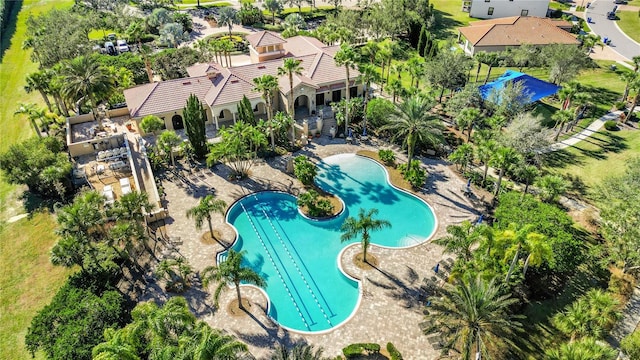 view of swimming pool featuring a patio area