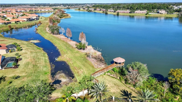 drone / aerial view with a water view