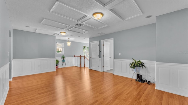 unfurnished room with light hardwood / wood-style floors