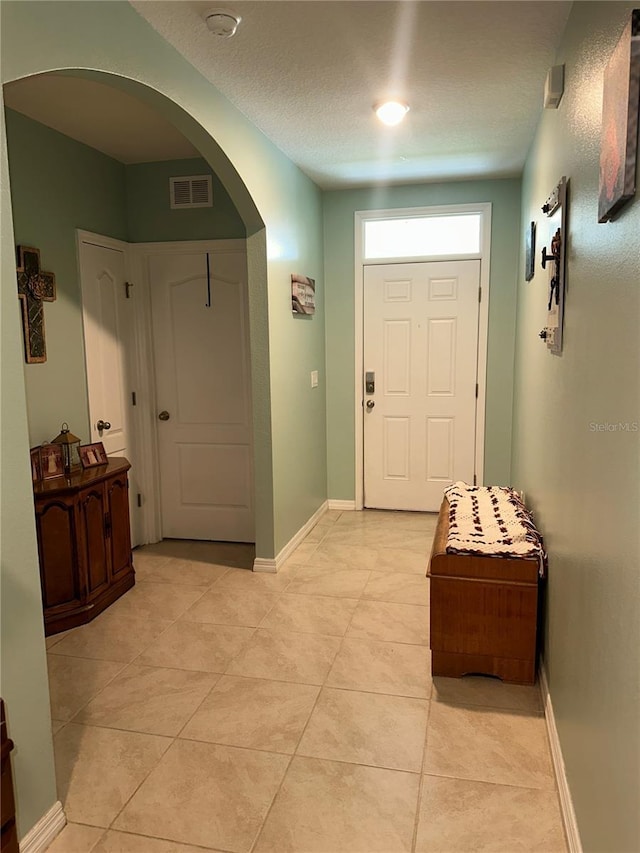 view of tiled entrance foyer