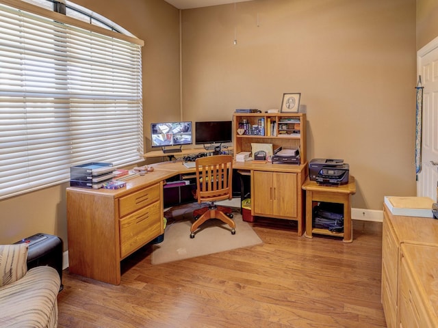 office area with light wood-type flooring